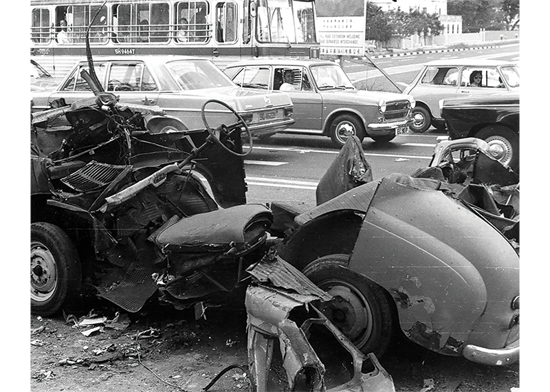 The wreckage of the car following the explosion near Still Road on 20 December 1974. Courtesy of Ministry of Home Affairs.